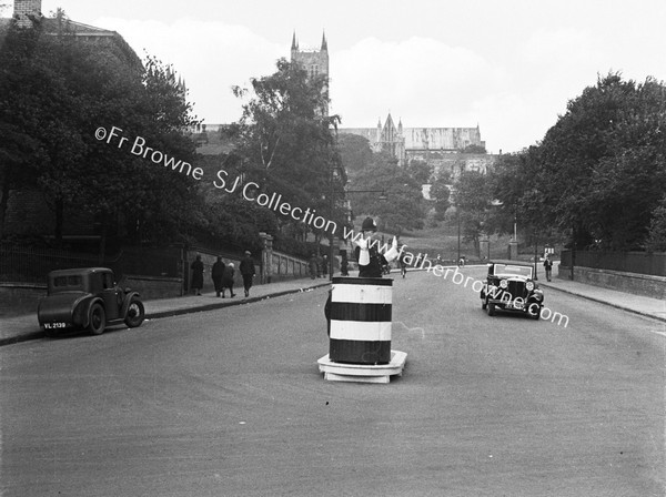 CATHEDRAL FROM HIGH STREET POLICEMAN IN BARREL